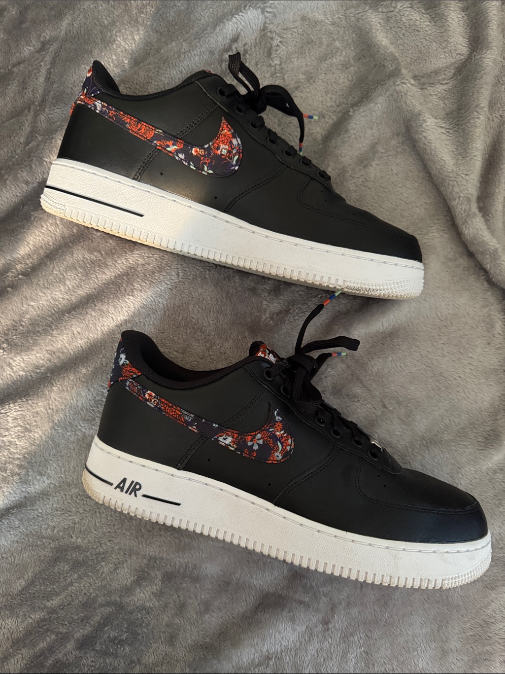 Nike Black Low-Top Sneakers With Orange Paisley Swoosh Accents